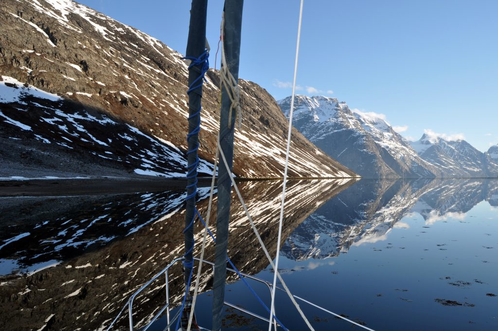 Reflection of mountains in the fjord